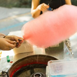 Cooking cotton candy on the street. Close-up